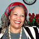 Toni Morrison smiles in her office at Princeton University in New Jersey, while being interviewed by reporters on October 7, 1993.